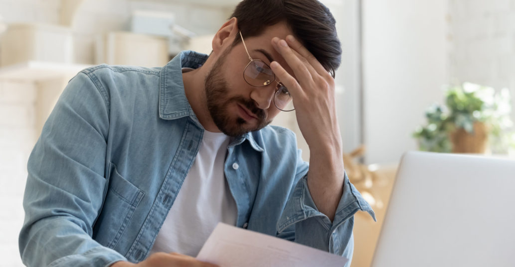 A small business owner looks at his finances.