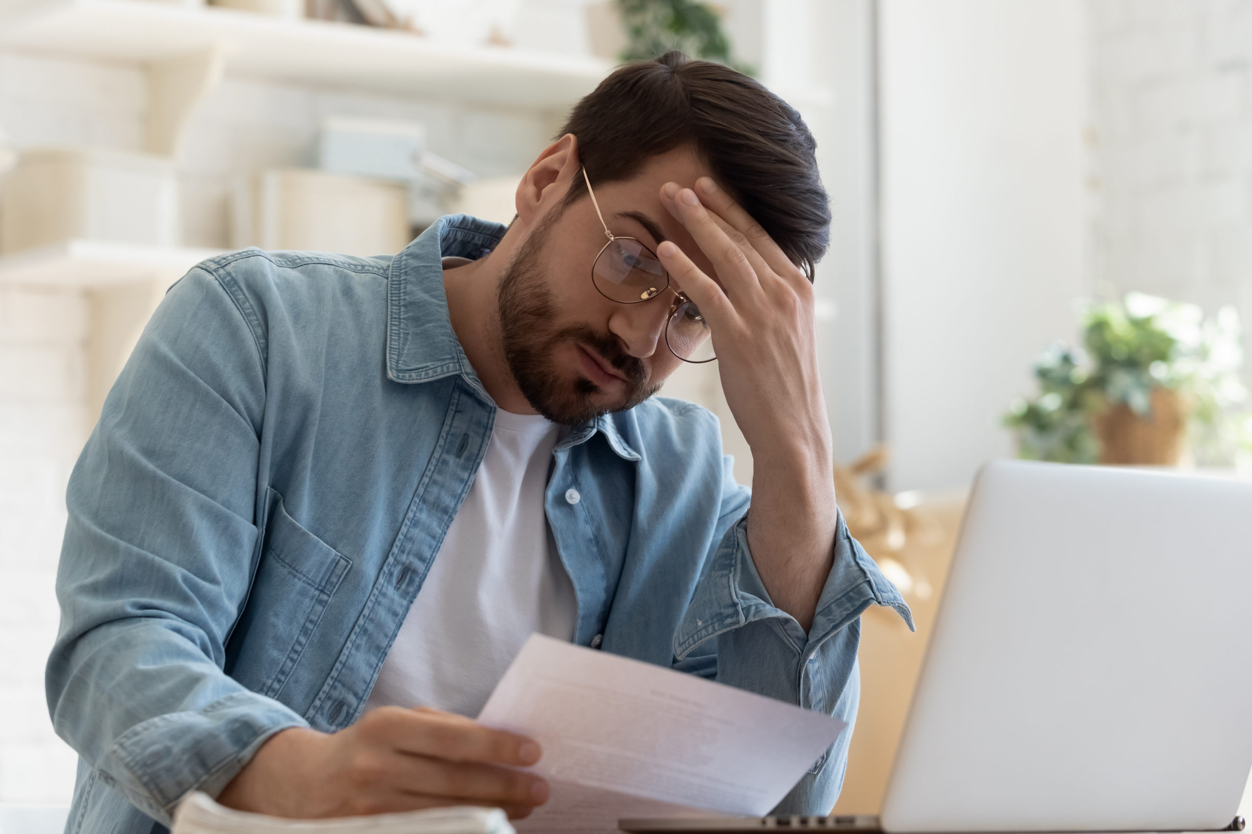 A small business owner looks at his finances.